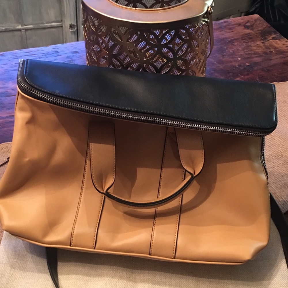 Brown and black flap purse